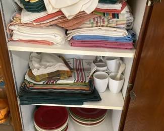 Lots Of Colorful Dining Dishes With Lots Of Placemats  Tablecloths