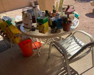 Light Metal And Glass Table With Four Chairs