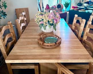 CUSTOM MADE DINING TABLE AND CHAIRS/2 LEAVES/8 CHAIRS/METAL GEARS ROLL OUT TO PLACE LEAVES IN