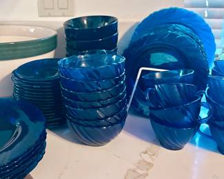 blue glass dishes and cups