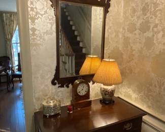 Georgian style carved mahogany framed wall mirror and sideboard. Porcelain lamp