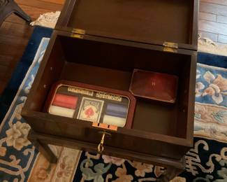 Vintage box on stand with brass binding and lock