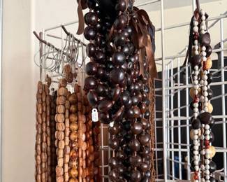 strands of wood beads and jewelry