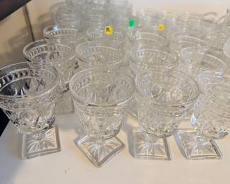 Full set of crystal water, dessert and wine glasses