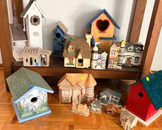 Large collection of birdhouse and ceramic collector item miniature houses