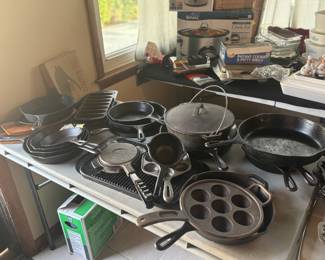 over 20 pieces of cast iron cookware. Lots of lodge. Some vintage unmarked too.