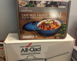 brand new cast iron dutch oven, all clad nib