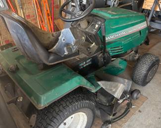 ranchking lawn tractor, tested runs great. Comes with attachments.