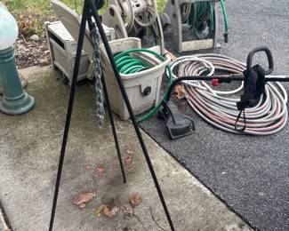 cast iron outdoor tripod for cast iron dutch oven ( goes over a campfire) 