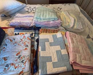 handmade and machine made by homeowner quilts and knitted blankets