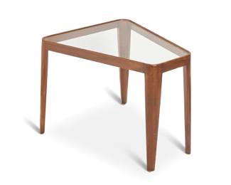 297 Edward Wormley (1907-1995) A trapezoidal end table model 4809 for Dunbar, mid-20th century With metal label: DUNBAR / BERNE INDIANA With glass top set in a wood frame with tapered legs 20" H x 22.25" W x 25.25" D Estimate: $400 - $600