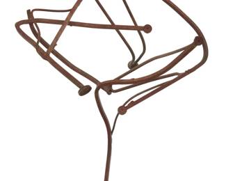 413 A Modern abstract wrought iron sculpture Mid-20th-early 21st century Unmarked With partial enameling, raised on a travertine base Overall: 28.75" H x 23" W x 21" D Estimate: $400 - $600