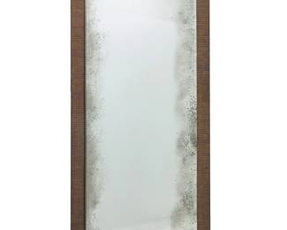 313 A Gregorius Pineo 'Calloway' floor mirror Early 21st century The rectangular plate within a textured patinated metal frame 102" H x 42" W x 2.25" D Estimate: $1,000 - $2,000