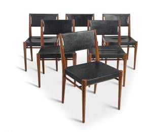 33 A set of six Modern side chairs Mid-20th century Each unmarked Leather and wood 6 pieces Each: 32.25" H x 20" W x 21" D Estimate: $700 - $900