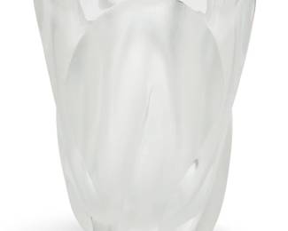305 A Lalique glass 'Ingrid' vase Late 20th century Designed 1964 by Marc Lalique (1900-1977) Etched to underside: Lalique ® France; numbered indistinctly 10.375" H x 9" Dia. Estimate: $300 - $500