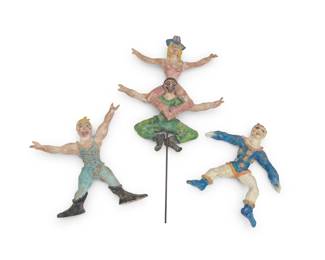 215 Beatrice Wood (1893-1998) A group of glazed earthenware models of circus performers, mid-20th century Each unmarked Comprising two figures and a conjoined group mounted on a metal rod 3 pieces Conjoined with rod: 14.5" H x 8.5" W x 1.75" D; Larger single: 7.625" H x 8" W x 1.5" D Estimate: $1,000 - $1,500