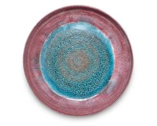 216 Beatrice Wood (1893-1998) A glazed earthenware plate, mid-20th century Signed to underside: BEATO 1.875" H x 11.625" Dia. Estimate: $1,500 - $2,000