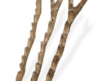 435 Three Dogon wood granary ladders 20th century Each with notched steps 3 pieces 80" H and 77" H and 72" H Estimate: $500 - $700