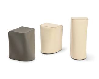 382 Three Skram Furniture Co. leather stools Early 21st century Each impressed to underside: skram / furniture company Leather clad wood 3 pieces Tallest: 25.5" H x 10.5" W x 12" D; Each shorter: 18.5" H x 12.75" W x 14.5" D Estimate: $300 - $500