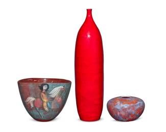 110 Polia & William Pillin (1909-1992 & 1910-1985) Three glazed ceramic vessels, mid-20th century Tall vase and pot each signed to underside: W + P Pillin; bowl signed: Pillin Comprising a tall red glazed vase, a flambé glazed pot, and a bowl depicting three female riders on horseback 3 pieces Vase: 18.25" H x 4.75" Dia.; Pot: 4.25" H x 7" Dia.; Bowl: 6.375" H x 8" Dia. Estimate: $400 - $600