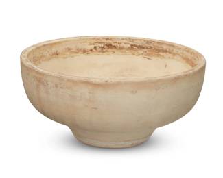 181 John Follis (1923-1994) An Architectural Pottery bisque earthenware bowl model S-20, mid-20th century Unmarked The footed bowl with flat rim 4.875" H x 10.5" Dia. Estimate: $600 - $800