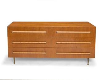 293 T. H. Robsjohn-Gibbings (1905-1976) A chest of drawers for Widdicomb Furniture Co., mid-20th century Drawer interior with partially legible label: Widdicomb The six drawers each with cane-wrapped brass pull, raised on tapered brass feet 32.25" H x 68" W x 21.5" D Estimate: $1,000 - $1,500