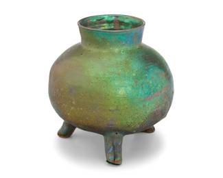 9 Beatrice Wood (1893-1998) A lustre glazed earthenware footed vase, mid-20th century Signed to underside: BEATO 7.125" H x 6.625" W x 7" D, irregular Estimate: $1,200 - $1,500
