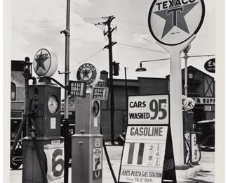 275 Berenice Abbott (1898-1991) "Gasoline Station, Tremont Avenue and Dock Street, Bronx," circa 1937, from "New York Portfolio III" Gelatin silver print on paper, dry mounted to a mat board support, as issued Edition: 58/60, printed circa 1979 Signed and numbered in pencil on the mount: Berenice Abbott; Parasol Press, Ltd., New York, NY, pub., with their black ink stamp on the verso of the mat board support Image/Sheet: 19.5" H x 15.5" W; Mat board support: 24.125" H x 19.625" W Estimate: $1,500 - $2,500