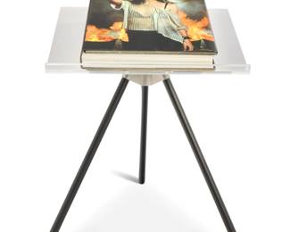 168 Annie Leibovitz (b. 1949) "Annie Leibovitz SUMO" (Patti Smith cover), 2014 Hardcover book on a stand Leibovitz, Annie. "Annie Leibovitz SUMO." Introduction by Steve Martin. Cologne, Germany: Taschen, 2014 Edition: 3,845 of 10,000 plus 300 artist proofs Signed by Leibovitz to edition page Stand designed by Marc Newson Book: 28" H x 20.5" W x 3.5" D; Stand: 38.5" H x 35" W x 35" D Estimate: $1,200 - $1,400