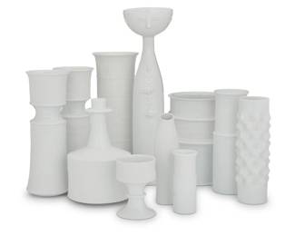 408 Tapio Wirkkala (1915-1985) A collection of porcelain vases for Rosenthal, mid/late 20th century Each with printed factory marks 11 Pieces Tallest: 18.5" H x 5" W x 4.625" D; Shortest: 5.125" H x 3.625" Dia. Estimate: $400 - $600
