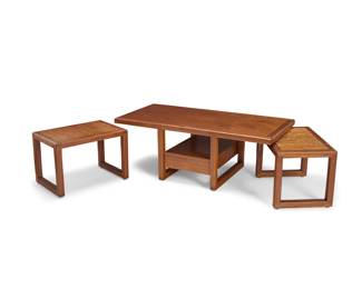177 A William Richardson coffee table and two nesting tables Circa 1980s Each table etched to a stretcher: WR The table with a central drawer 3 pieces Coffee table: 18.75" H x 51.5" W x 24.25" D; Each nesting: 16.5" H x 16" W x 24.25" D Estimate: $600 - $800