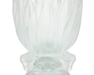 302 A Lalique glass 'Three Jaguars' vase Late 20th/early 21st century Etched to underside: Lalique ® France / 929; with factory label 11.25" H x 8.25" Dia. Estimate: $500 - $700