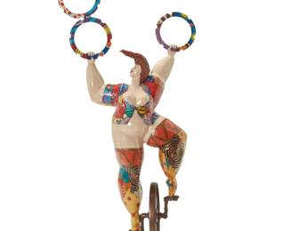 71 A large Niki de Saint Phalle style figural sculpture 2007 Signed and dated verso: OG / 07 Possibly by Omar Garcia, in the style of Niki de Saint Phalle (1930-2002), the polychrome metal figure depicted on a unicycle and juggling four rings 69.5" H x 30" W x 16" D Estimate: $600 - $800