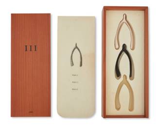 105 Lorna Simpson (b. 1960) "III" (Three Wishbones in a Wood Box), 1994 Three ceramic, bronze, and rubber wishbones within molded felt printed with waterless lithography in the original cedar wood box Edition of 5000 Attributed, dated, titled, editioned, and inscribed to lid interior Published/printed by The Peter Norton Family Christmas Project/21 Steps, Portland, Oregon 2.25" H x 5.5" W x 13.75" D Estimate: $500 - $700