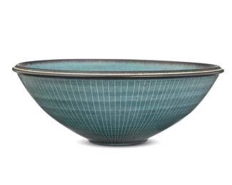 248 Harrison McIntosh (1914-2016) A glazed stoneware bowl, mid-20th century Impressed with potter's chop mark: HM; applied paper label to the underside: Handthrown Stoneware / Harrison McIntosh / Claremont / California With pale blue glaze and sgraffito lines 4.625" H x 12.625" Dia. Estimate: $2,000 - $3,000