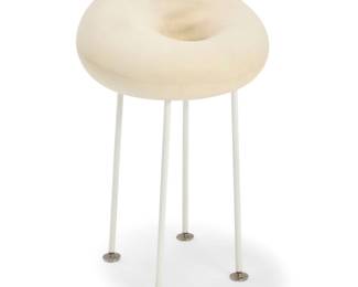 383 Attributed to Philippe Starck (b. 1949) A Modern foam stool, circa 2000 Unmarked The formed foam seat raised on four enameled metal legs 21.75" H x 13.5" Dia. Estimate: $300 - $500