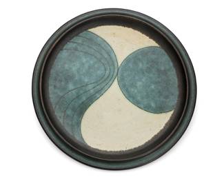 260 Harrison McIntosh (1914-2016) A glazed stoneware plate, mid-20th century Impressed with potter's chop mark: HM; applied paper label to the underside: Handthrown Stoneware / Harrison McIntosh / Claremont / California With cerulean blue and cream glazes, and mishima lines 1.375" H x 12.625" Dia. Estimate: $1,000 - $1,500