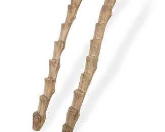 436 Two Dogon wood granary ladders 20th century Each with notched steps 2 pieces 83.5" H and 78" H Estimate: $400 - $600