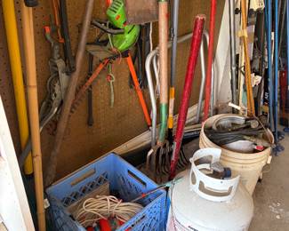 Gardening tools. Propane tank.