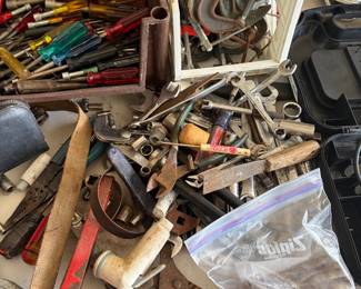 Tools. Wrenches. Screwdrivers. Hammers.