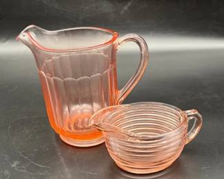 Pink Depression Glass pitchers 