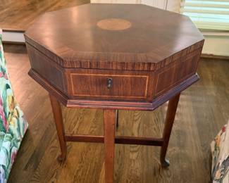 I would bet this is a Theodore Alexander Table. 