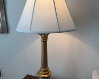 Pair of ornate brass lamps