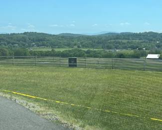 Park facing the fence line. 