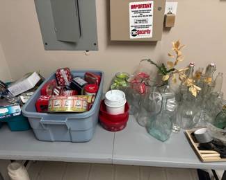 Tins, bottles, vases