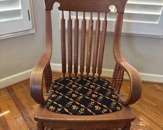 Rocking chair with beautiful embroidered details 