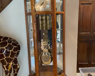 Grandfather clock Howard Miller Majestic II floor clock and curio cabinet 