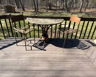 Fantastic iron bar height 1/2 moon stone top table & 2 chairs . Intricate decor on base of the table 