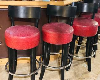 Vintage red vinyl swivel bar stools 