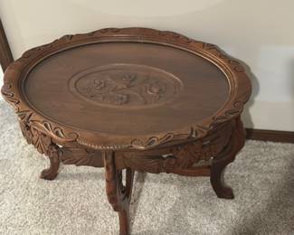 Walnut carved table with removable glass top 